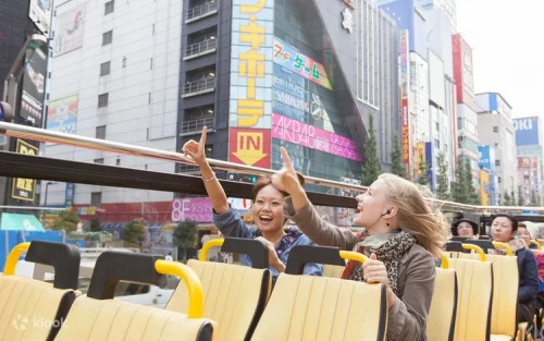 Listening to the multilingual smartphone audio guide while touring Japan