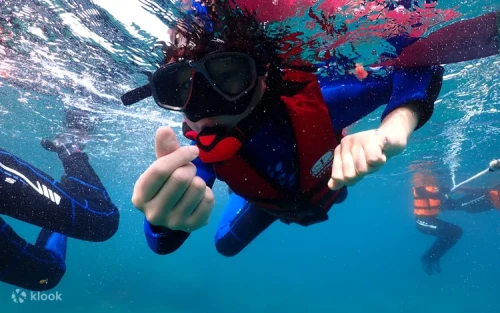Enjoying a transparent canoe ride on the azure waters of Pingtung