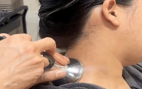 Relaxing infrared scalp spa on an automatic massage bed