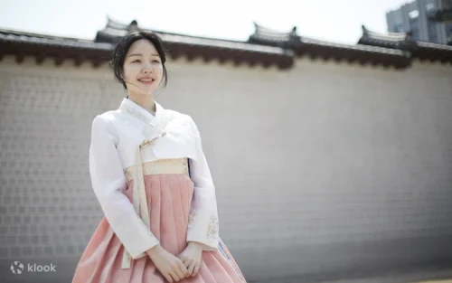 Family wearing matching children and adult Hanboks in South Korea