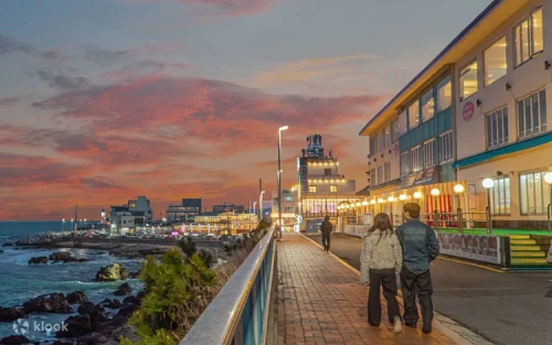 Beautiful sunset hues reflecting off the ocean from the Haeundae Blue Line Park