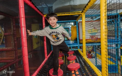 Toddlers safely exploring the padded Poco's Toddler Zone
