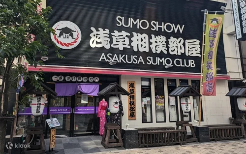 Guests participating in the interactive Sumo Challenge in Tokyo