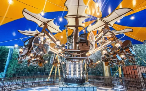 The thrilling Time Rider coaster wheel soaring above the park