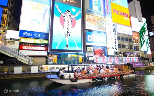 Clear-roofed sightseeing boat gliding through the vibrant waterways of the city