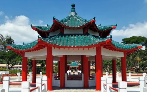 Visitors exploring the historical Da Bogong Temple on Kusu Island