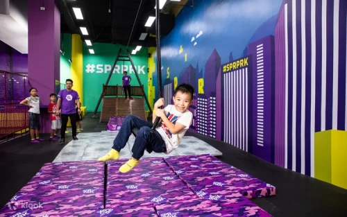 Family competing together in the interactive Game Arena