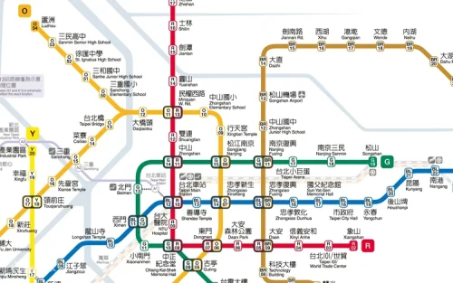 Modern and clean Taipei Metro train arriving at a bustling city station