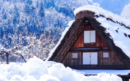 Historic wooden merchant houses and traditional sake breweries along Sanmachi Street in Takayama