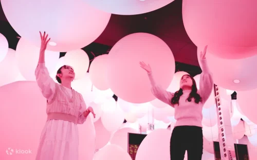 Interactive stepping stones emitting vibrant colors in the digital art museum